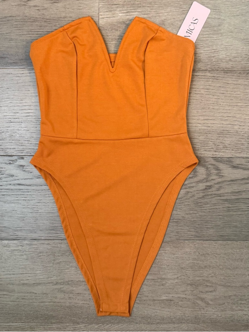 NWT Micas Strapless V-Notch One-Piece Bodysuit in Burnt Orange